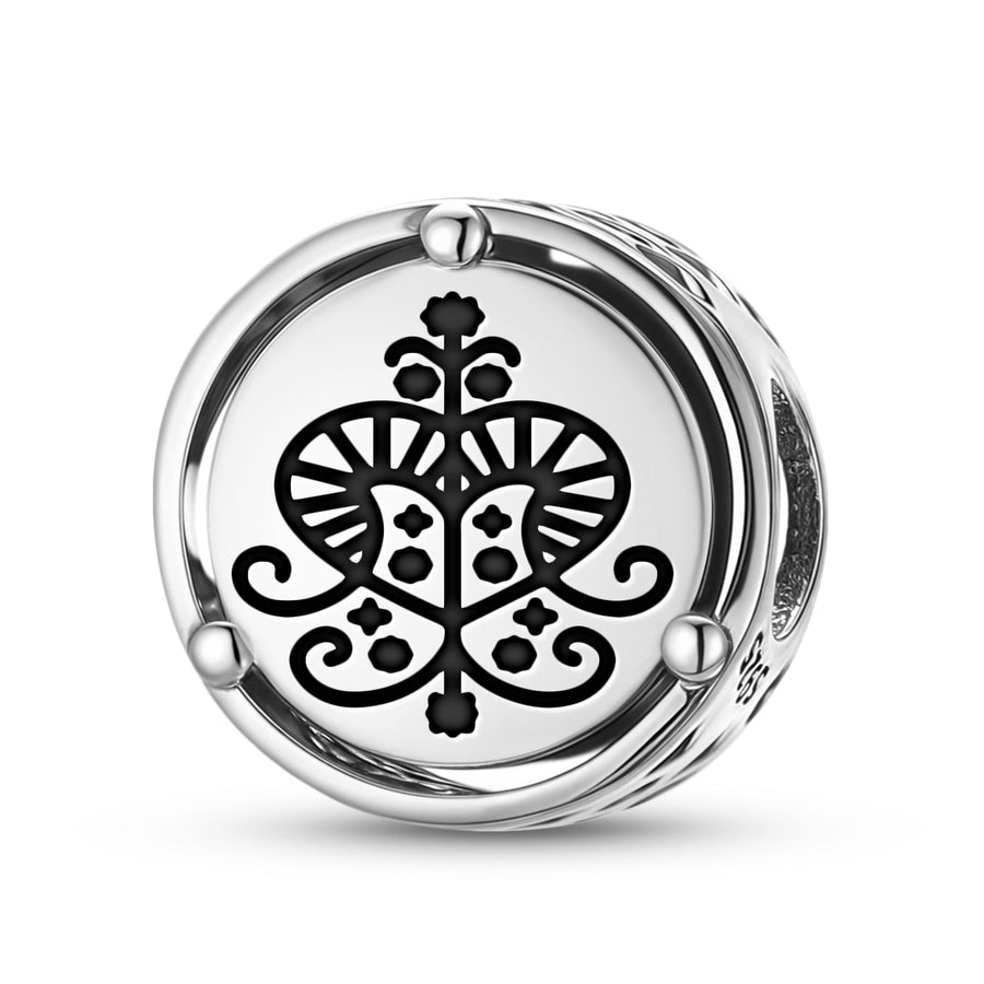 Erzulie-inspired charm representing the Haitian Vodou Journal cluster