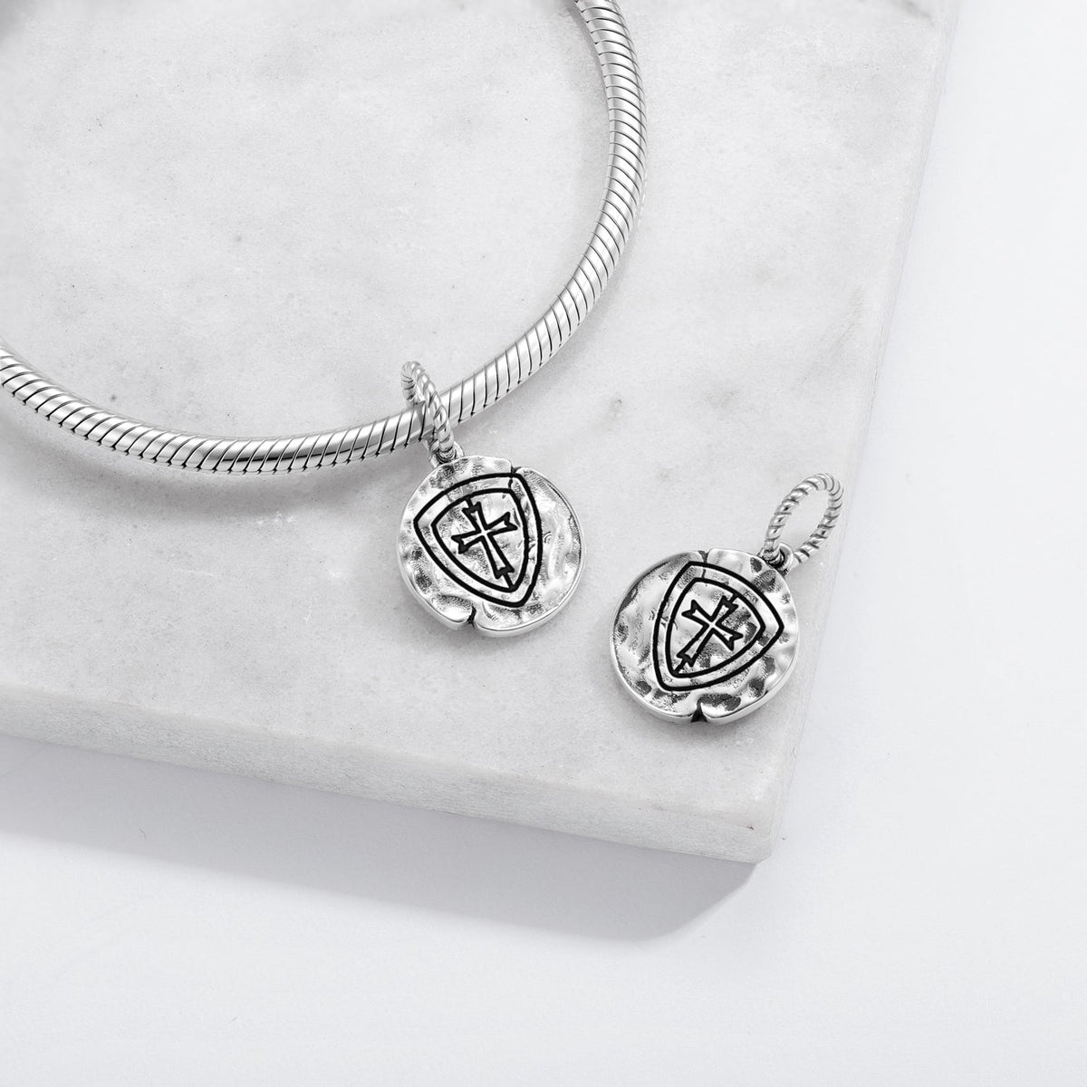 Templar-inspired shield and red cross dangle charm