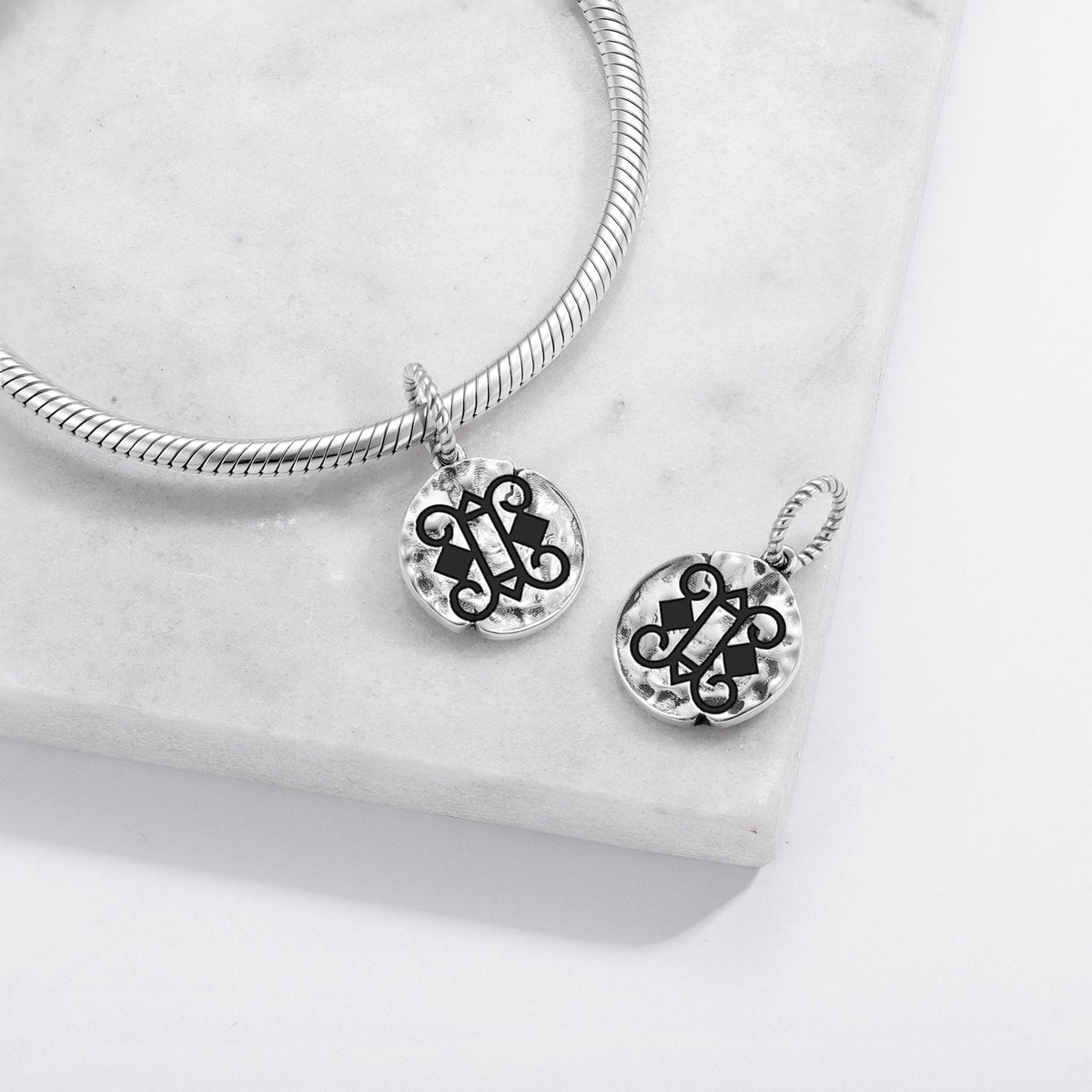 Otumfuo Wuo Ye Ya Adinkra symbol charm