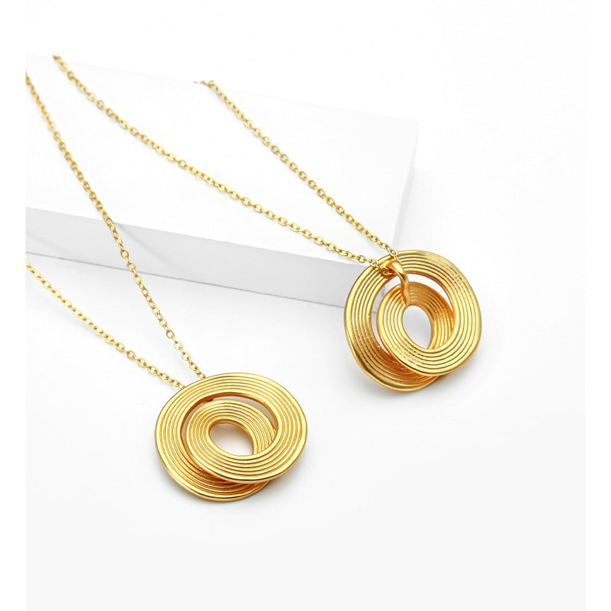 Gold-Tone Circular Pendant Necklace – Copper