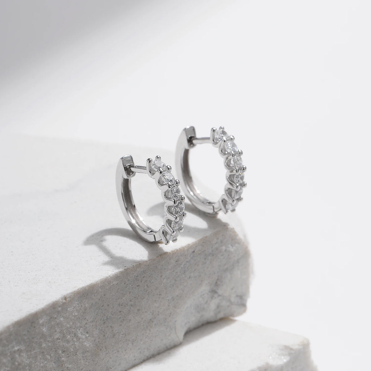 Petite moissanite huggie earrings – view 3