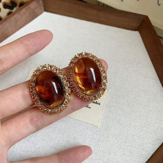 Golden Oval Marbled Resin Earrings – Retro Studs