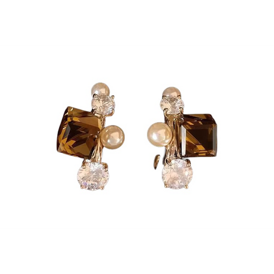 Coffee-tone curved stud earrings on white background