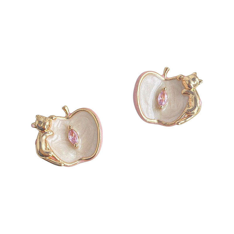 Lotus enamel kitten stud earrings on white background
