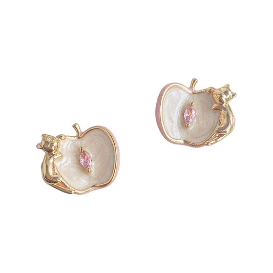 Lotus enamel kitten stud earrings on white background