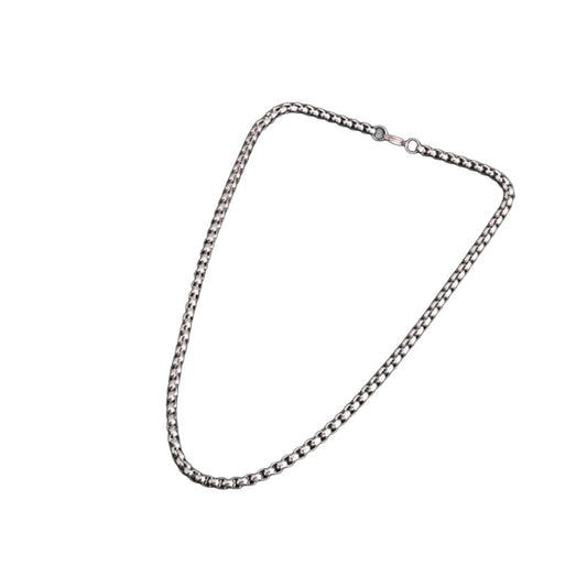 Polished rolo chain necklace on white background