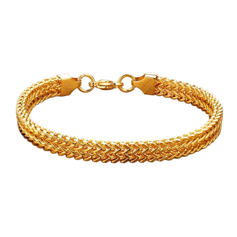 Gold-tone twisted chain bracelet on white background