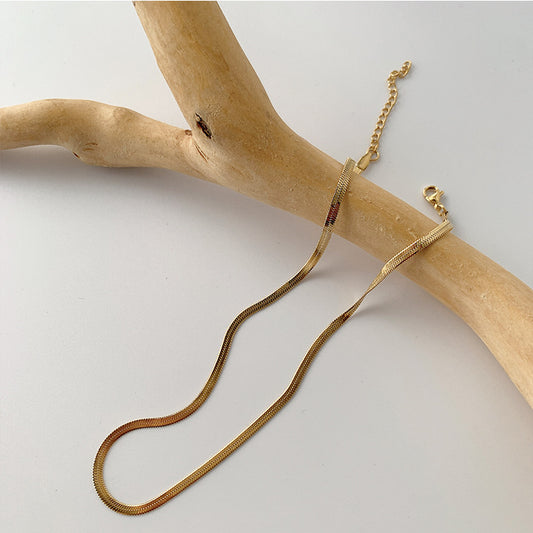 Flat Snake Bone Chain Necklace – Gold Plated Titanium Steel