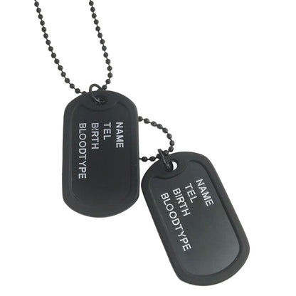 Black stainless steel dog tag necklace on white background