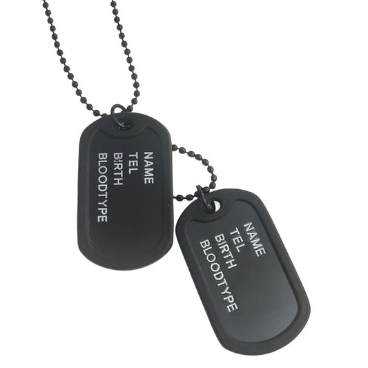 Black stainless steel dog tag necklace on white background