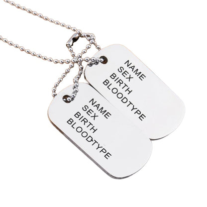 Silver hip hop name dog tag necklace on white background