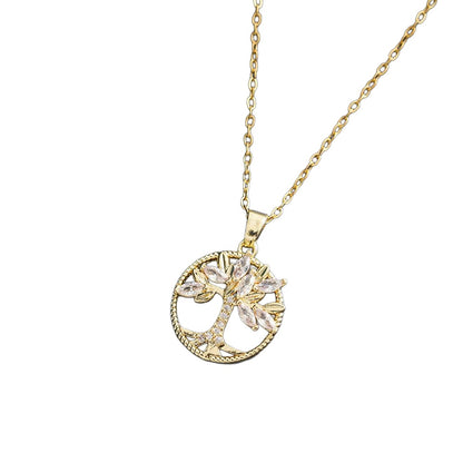 Gold hollow rose necklace on white background