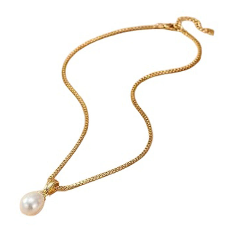 Minimalist gold clavicle chain with pearl pendant on white background