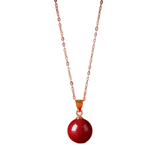 Purple gold-sand cinnabar necklace on white background