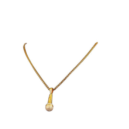 Rhinestone microphone pendant necklace in gold tone on white background